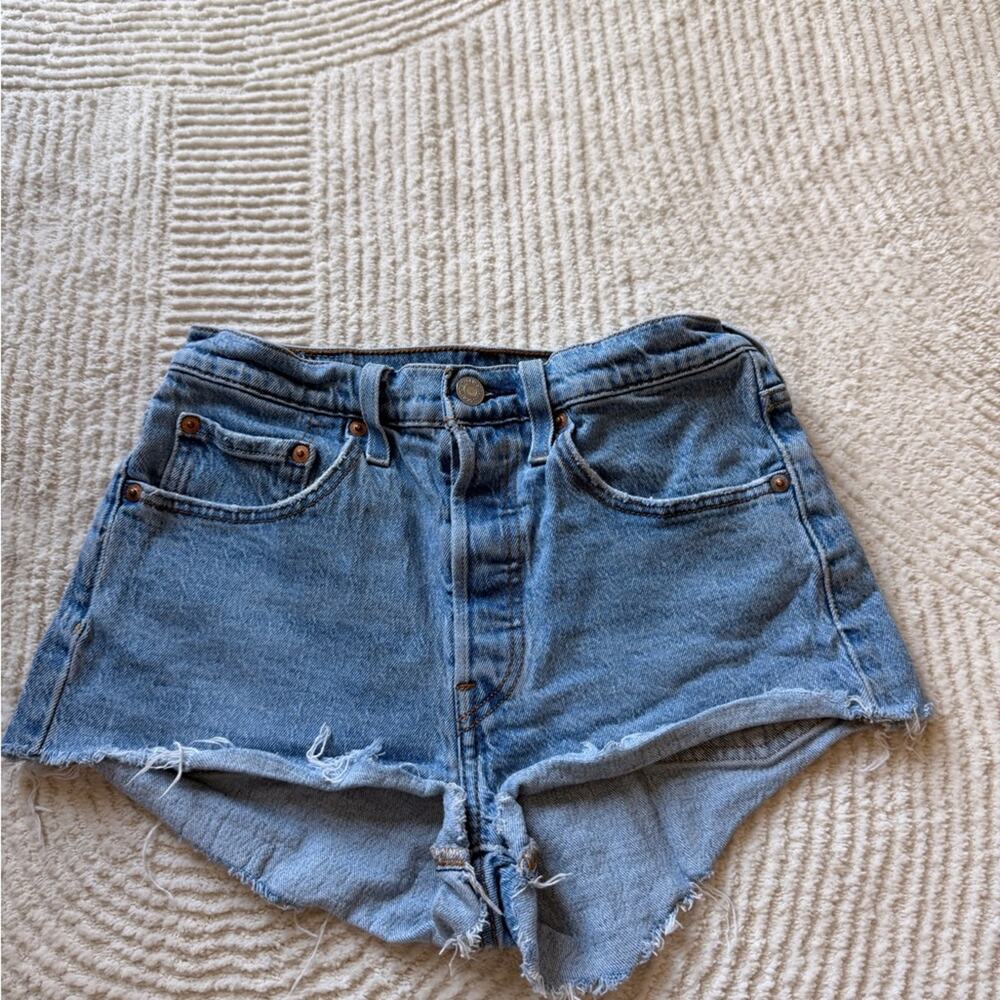 Vintage style Levi's Light Blue Distressed High-Rise Denim Shorts